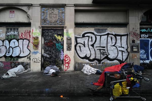 People sleeping on the street in Skid Row.