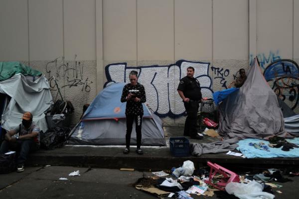 A homeless woman near her tent on Skid Row.