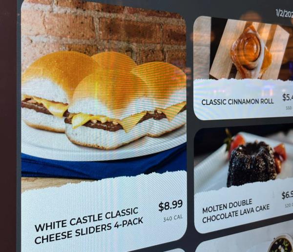 Vending machines at Hollywood Casino in Bexley, Ohio, offering hot food items including White Castle sliders, cinnamon rolls, potstickers, and breakfast sandwiches.