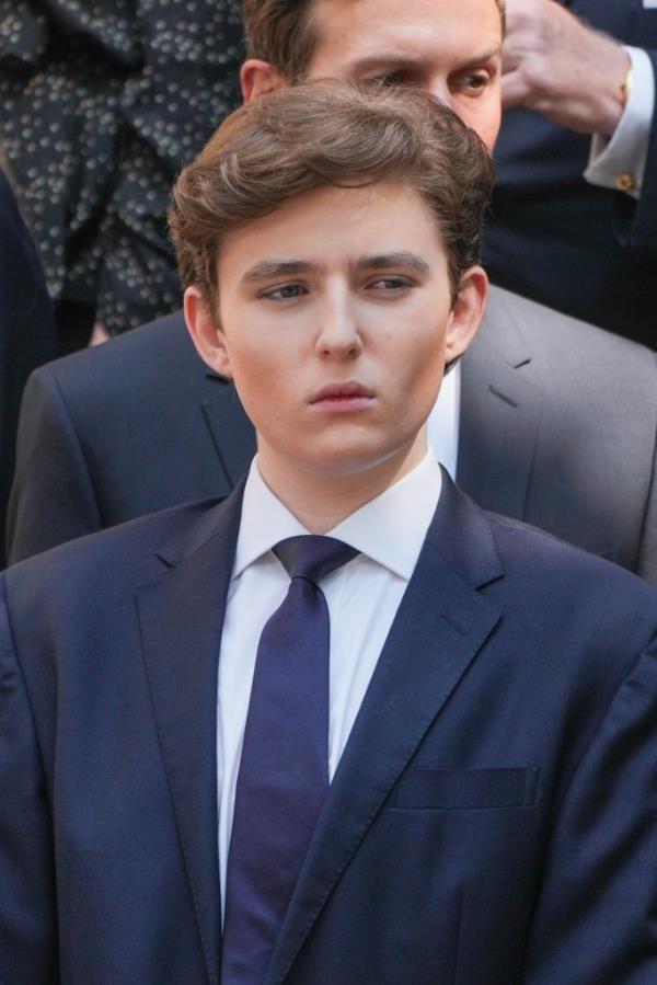 Barron Trump is pictured in a suit