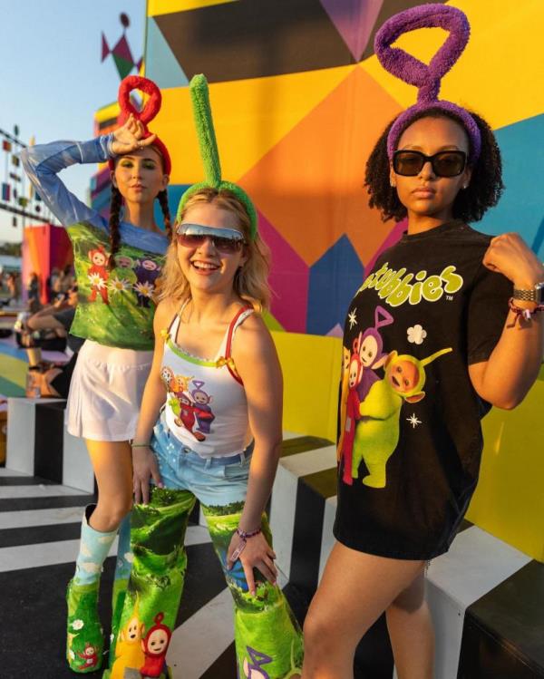 Women wearing Teletubbies clothes at Coachella. 