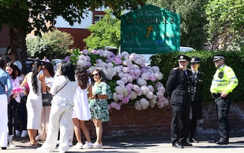 Merseyside Fire & Rescue Service Chief Fire Officer Phil Garrigan (3R) and Merseyside Police Chief Co<em></em>nstable Serena Kennedy (2R) were among those in attendance