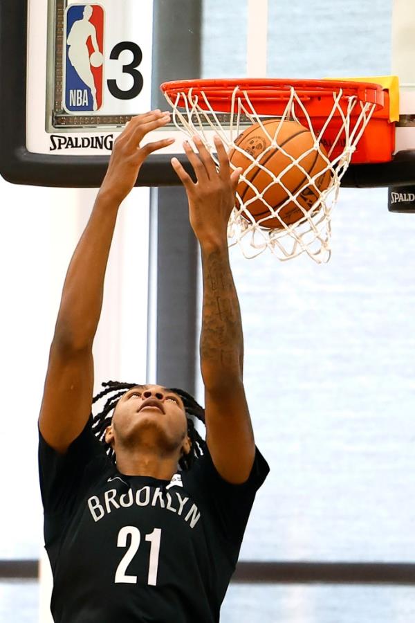 Noah Clowney dunks the ball during a July 8 practice.