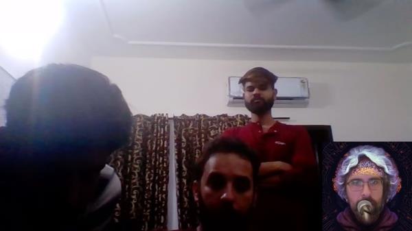 A group of three men staring into a webcam in surprise, with a YouTube avatar bottom right.