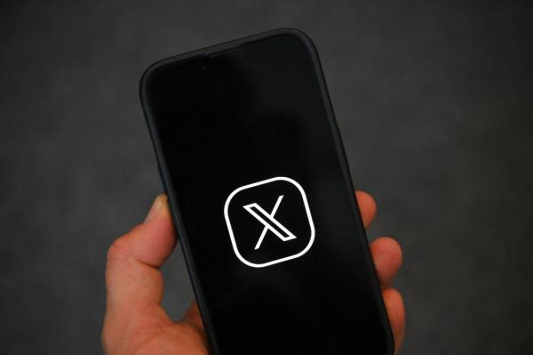 X logo on a smartphone.