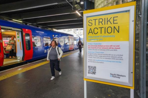 A sign at Waterloo station warning of strike action on Friday 1 September by train drivers from ASLEF unio<em></em>n affecting services by train operaing companies Rail strike annoucement, Waterloo Station, London,