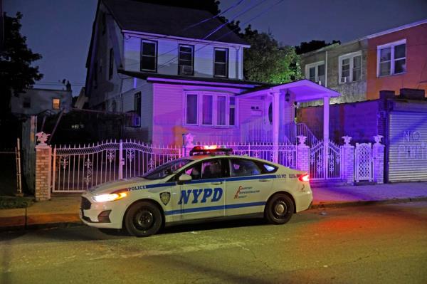 Police officers at a crime scene on 164 Street and 108 Avenue, respo<em></em>nding to a verbal dispute turned deadly assault.