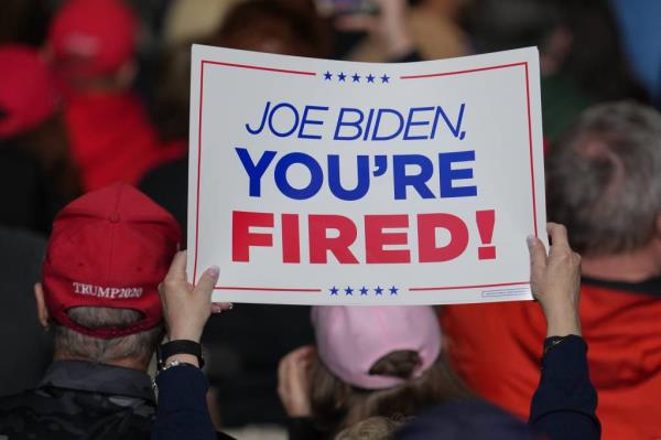 Fans wait for Republican presidential candidate Do<em></em>nald Trump to speaks to supporters in Greensboro, North Carolina on March 2, 2024.