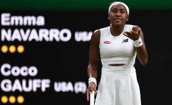 Coco Gauff reacts after her shot against Emma Navarro was shown to have been out.